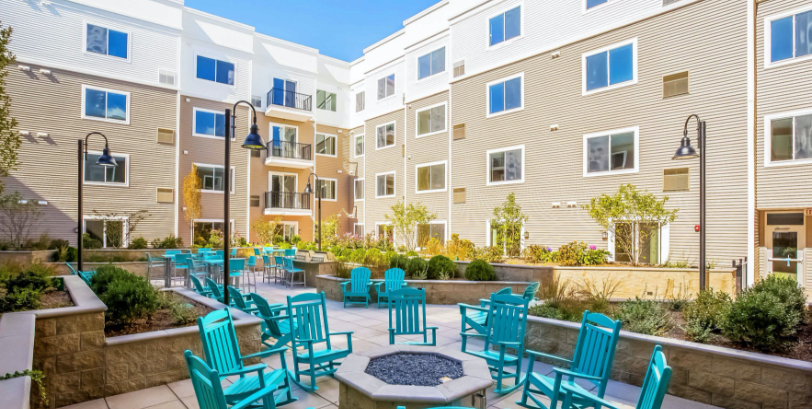 one-glover-home one glover norwalk apartments with resident courtyard and fire place