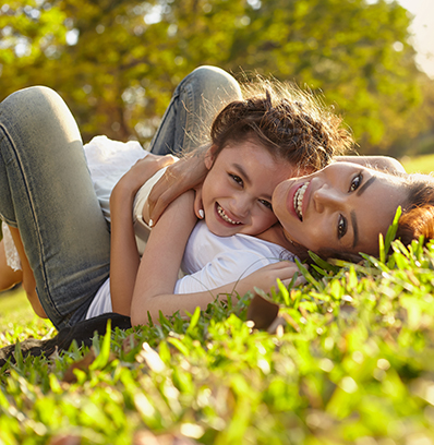 Lifestyle,Portrait,Mom,And,Daughter,In,Happines,At,The,Outside Lifestyle portrait mom and daughter in happiness at the outside in the meadow - The Beacon Building Jersey City, NJ
