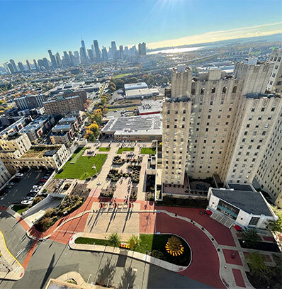 bjc-difference-land The Beacon Building Jersey City, NJ Aerial View