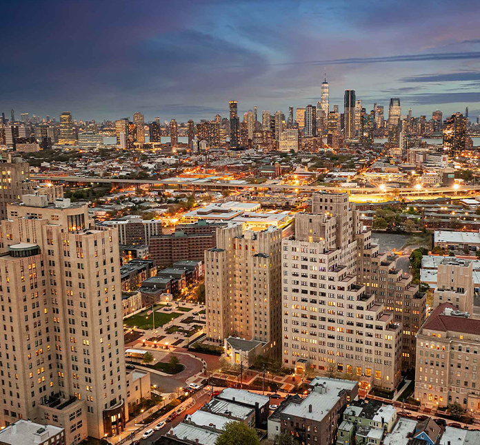 BJC-aerial_background-night Beacon Building Jersey City View Night time