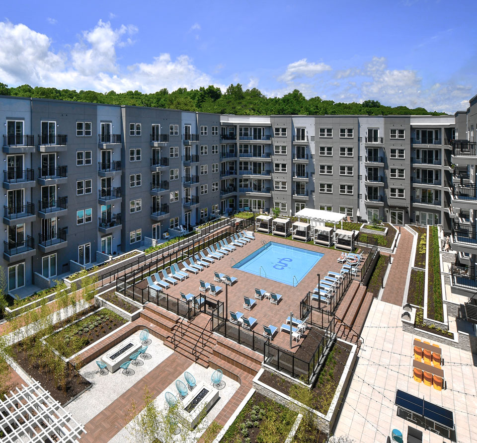 Courtyard With Pool at The Curb Apartments in Norwalk, CT Courtyard With Pool at The Curb Apartments in Norwalk, CT